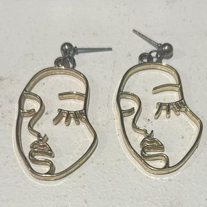 face earrings